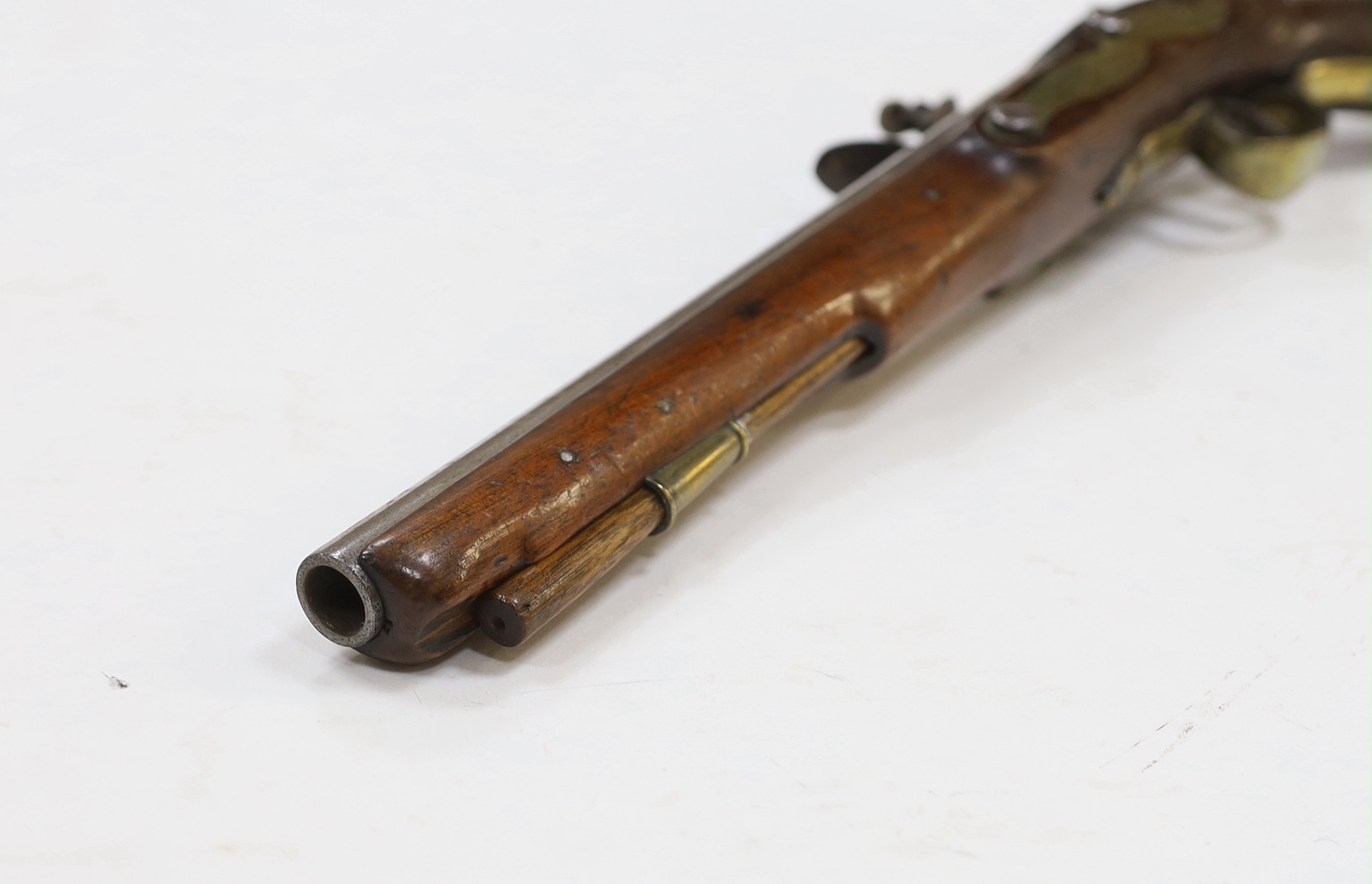 An early 19th century flintlock pistol, fully stocked with Tower proofs and crown over GR stamp to lock, plain brass butt cap and trigger guard